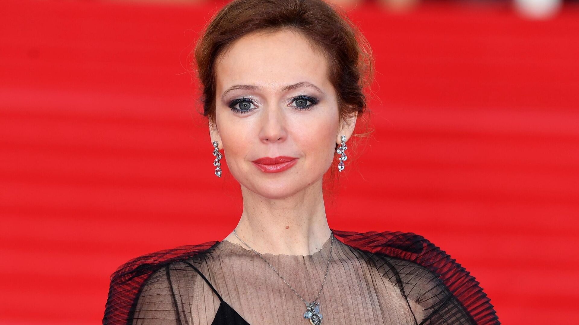 Елена Захарова